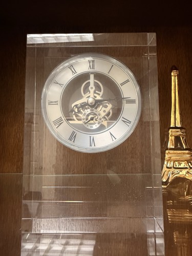 Glass skeleton face clock